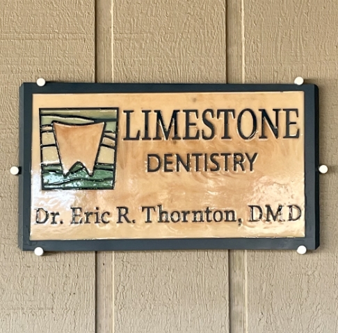 Limestone Dentistry sign on dental office door