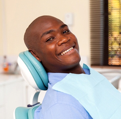 man smiling after understanding the implant process in Jeffersonville