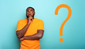 Man wondering next to orange question mark about how many dental implants he might need